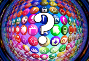 social media icons on a globe behind a white question mark