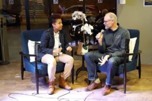 Jamilah Corbitt and Brian Loebig talking at Mavericks on the Move 11/14/2018